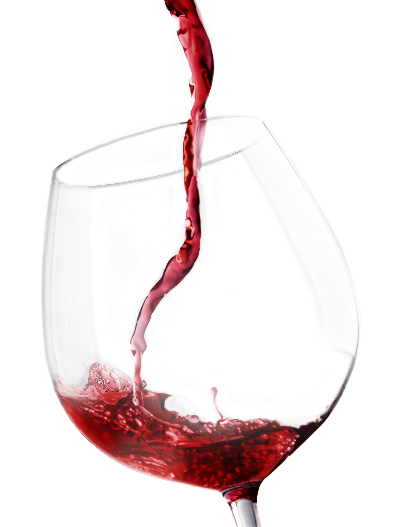 Vin hældes op i glas